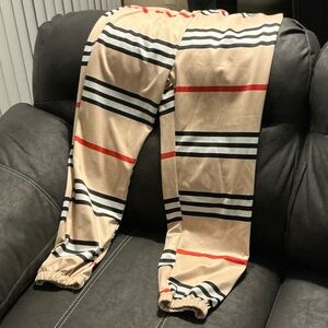 Beige Striped Joggers with Red and Black Accents